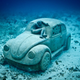 Illustration for article titled The Astonishing Treasures of Underwater Art Galleries